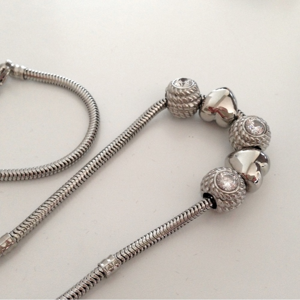 Heart and crystal charm necklace.